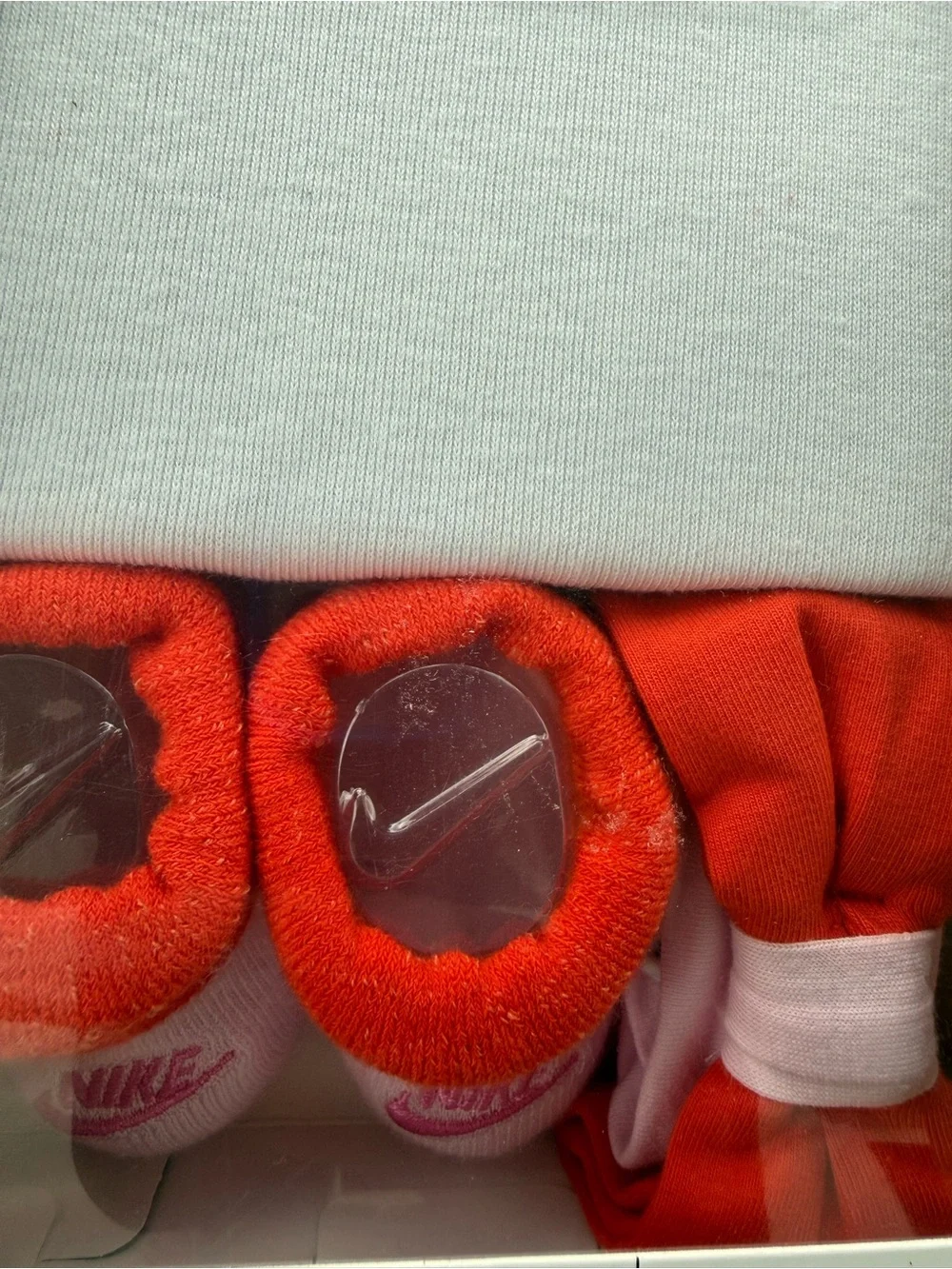 New girls Nike Baby 3-Piece Set in White and Red with Multicolor Icons